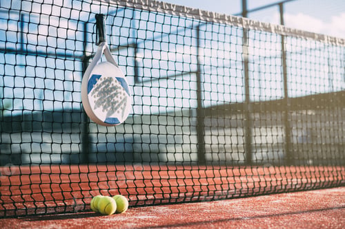 Preview: Padel blade racket hanging on the net