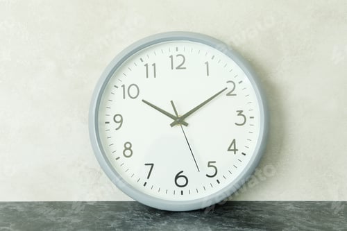 Preview: Standard gray clock against white textured background
