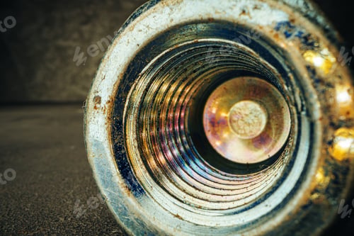 Preview: Metal nut on black background close up