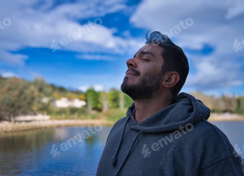 Preview: Adult breathing fresh air in the park or forest.