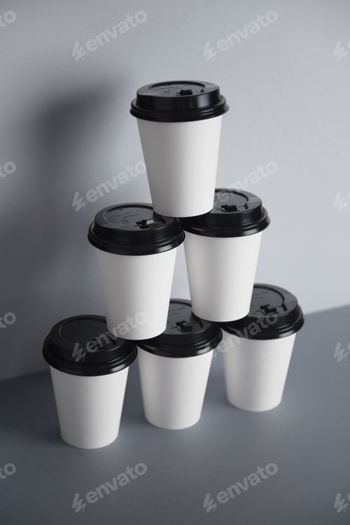 Preview: White paper cups isolated on gray mockup set