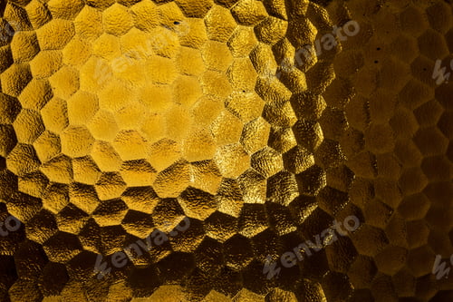 Preview: Abstract yellow coloured honeycomb shaped backlit glass background