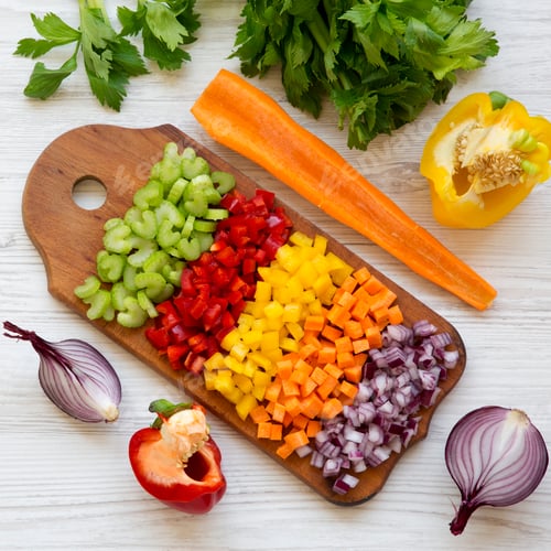 Preview: Top view, chopped fresh vegetables (carrot, celery, onion, colored peppers)