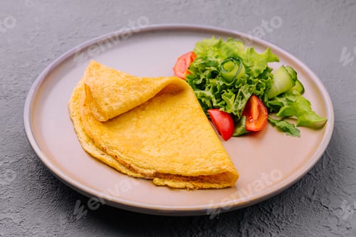 Preview: pancake with green salad on plate