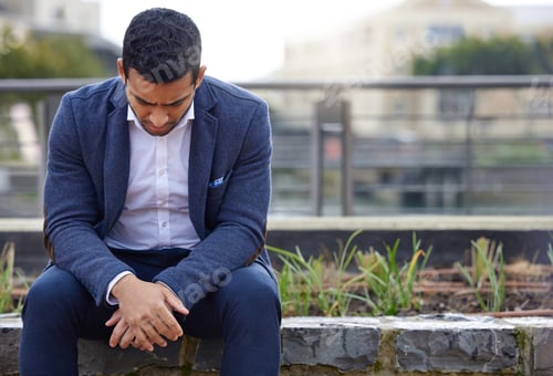 Preview: Life can make any man weary. Shot of a young businessman looking upset.