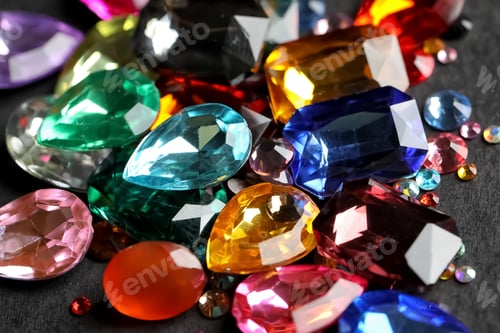 Preview: Beautiful gemstones for jewelry on dark background, closeup