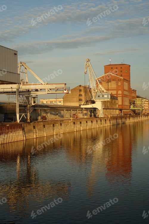 Preview: Vertical shot of a Rhine harbor with construction cranes in Karlsruhe, Germany