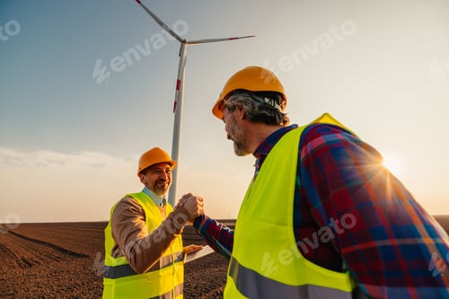 Preview: Two engineers at work in wind turbine power station