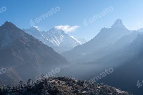Preview: Snowy Mountains Under a Clear Blue Sky