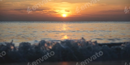 Preview: Landscape image of a beautiful sunset sky and sea wave on beach with splash