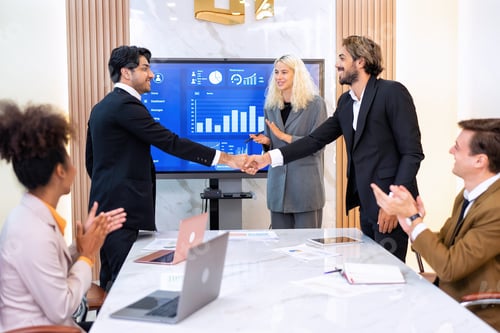 Preview: Team business meeting in room brainstorm together and Shaking hands for success operation winner
