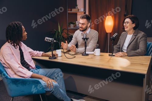 Preview: Content creators recording a podcast episode in a professional studio, discussing