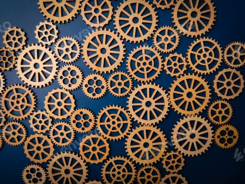 Preview: Top view wooden gear on a blue background