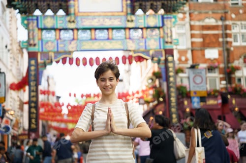 Preview: Cheerful teenage girl enjoying in Chinatown, London