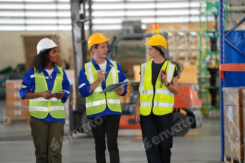 Preview: Young warehouse workers working together. Business distribution supply and logistic shipment.