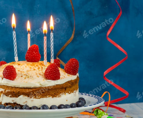 Preview: birthday cake with candles and streamer