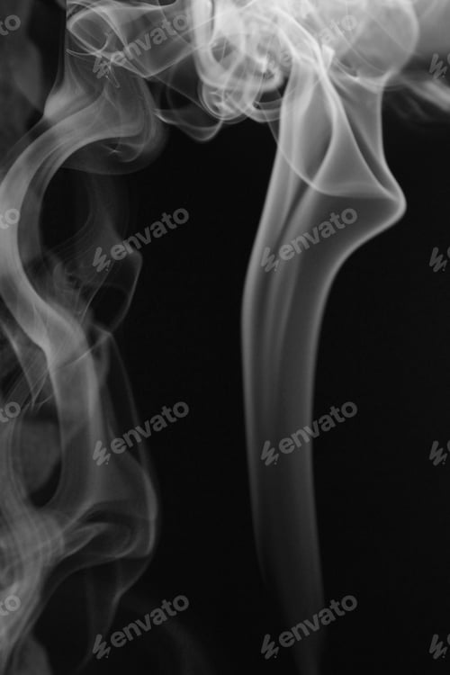Preview: Vertical shot of smoke isolated on a black background