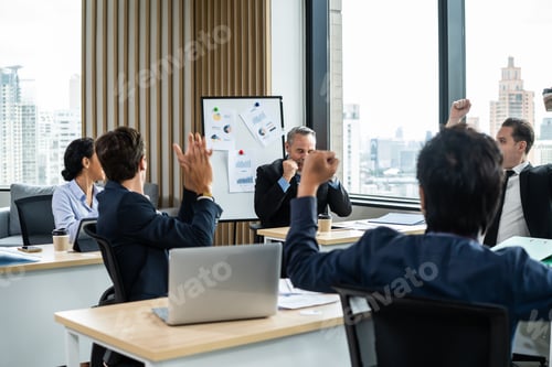 Preview: Group of young attractive business people working in office workplace.