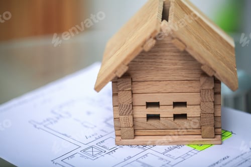 Preview: Building house on blueprints with plan - construction project