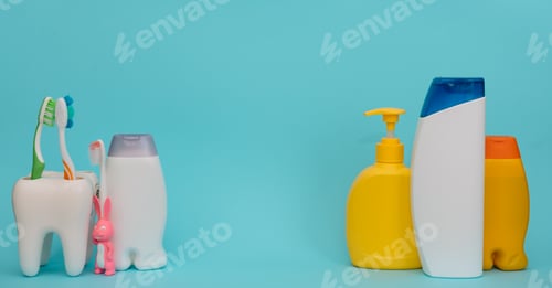 Preview: Shower accessories on a colored background. bathroom setting on blue background.