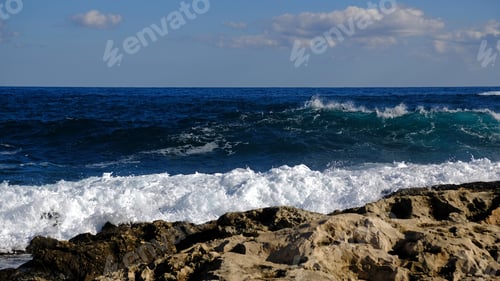 Preview: Blue sea wave and white foam and splash.