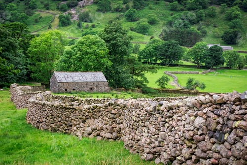 Preview: Stone wall and a house in the Lake District, England
