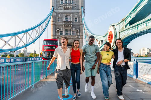 Preview: Multiracial group of happy young friends bonding in London