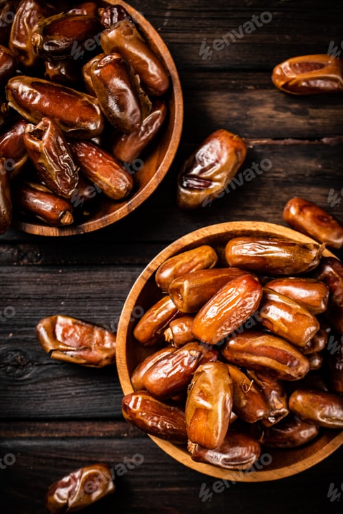 Preview: Fresh dates in two plates.