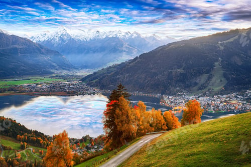 Preview: Spectacular autumn view of lake meadows trees and mountains in Sell Am See