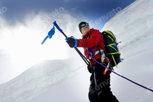 Preview: Mountaineers holding walking poles looking away smiling, Saas Fee, Switzerland