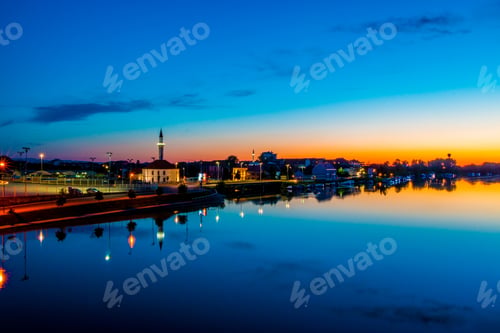 Preview: Wide shot of the beautiful sunset over Bosnia and Herzegovina with reflections in the water