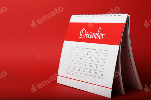 Preview: Paper calendar on red background, space for text. Planning concept