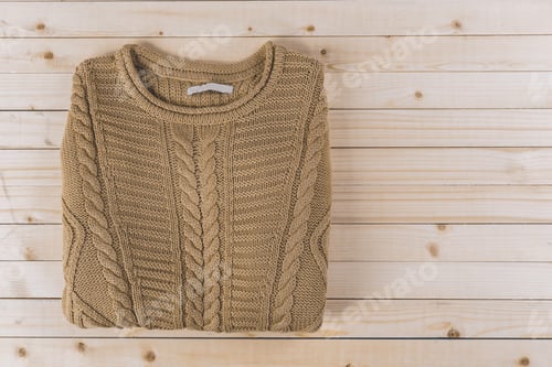 Preview: Stack of cozy knitted sweaters