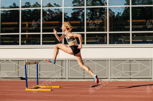 Preview: female athlete run 400 meters hurdles