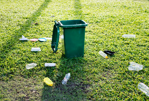 Preview: Garbage bin and garbage on the ground