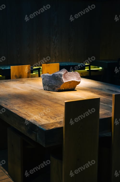 Preview: Interior detail of modern asian cafe with wooden table and chairs.