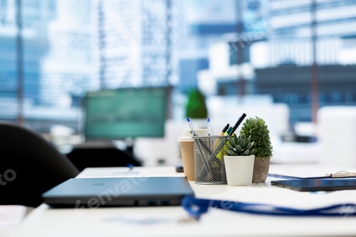 Preview: Focus on laptop in empty company financial department