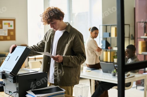 Preview: Office manager with financial papers