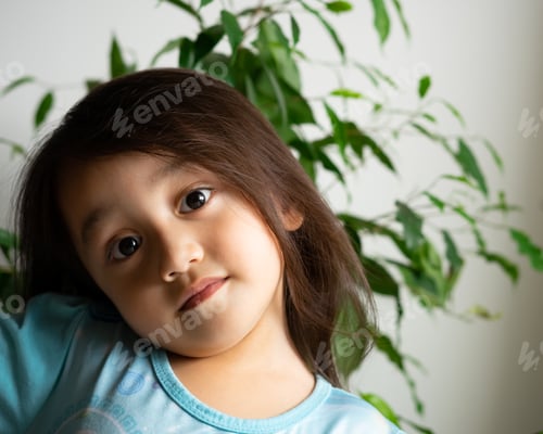 Preview: adorable little toddler girl. portrait with trees, nature, plants