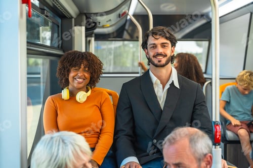 Preview: Diverse smiling people traveling together on public bus