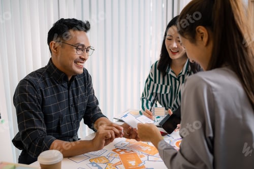 Preview: A group of UX/UI designers brainstorming creative ideas together