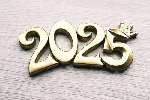 Preview: Golden numbers "2025" are elegantly displayed on a light background,