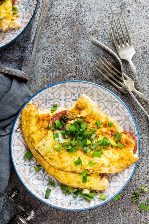 Preview: Omelet or omelette with fresh green onion, scrambled eggs
