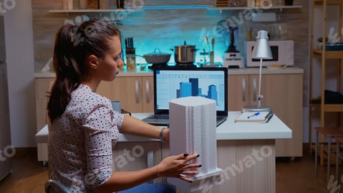 Preview: Architect matching prototype with plans from laptop