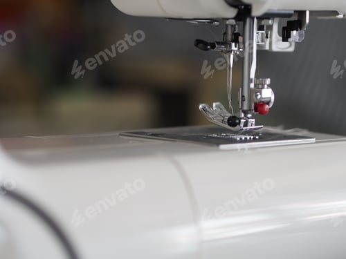 Preview: Closeup sewing machine accessories equipment
