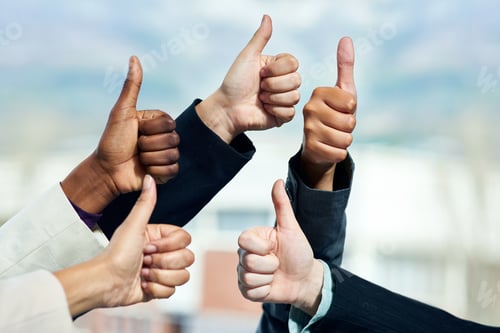 Preview: We all approve. Cropped shot of a group of businesspeople showing a thumbs up gesture.