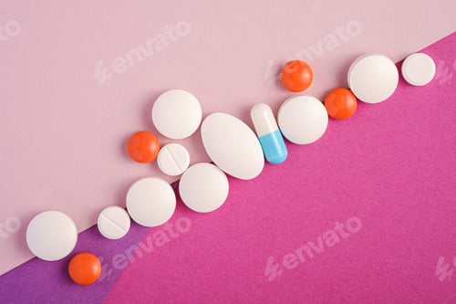 Preview: Pills and tablets on pink background, healthcare medical concept, antibiotics and cure