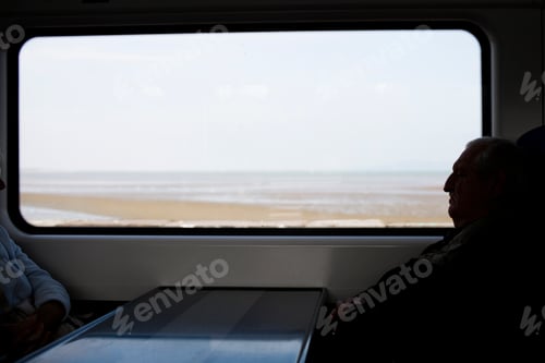 Preview: Business people travelling in train