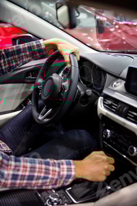 Preview: Young man changing gears in the car