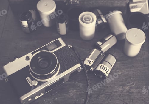 Preview: Closeup of film camera on wooden table